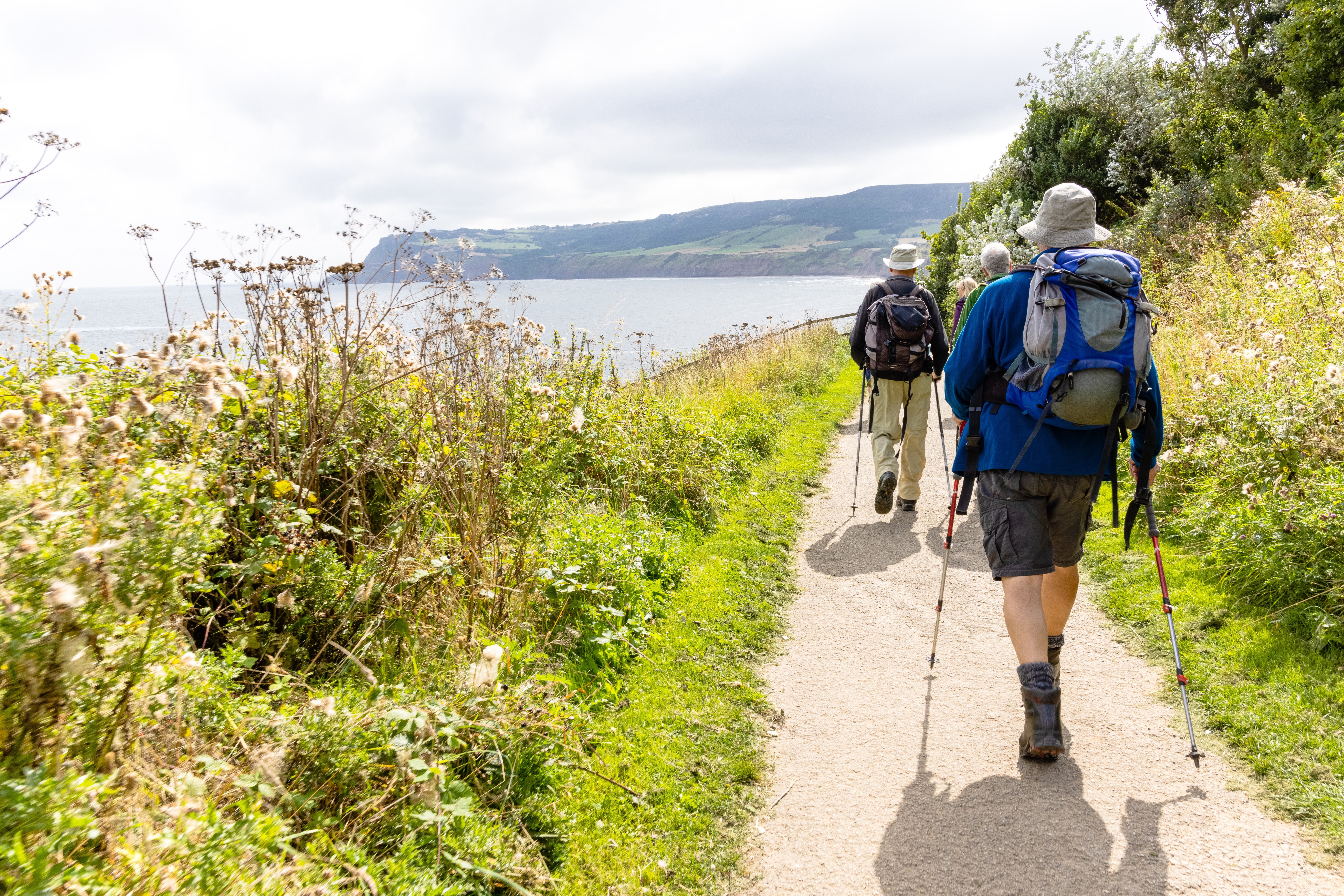 Group of walkers on path in Robin Hood's Bay