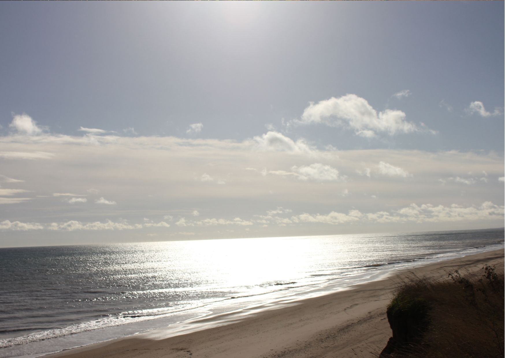 sandy beach and sea at sunrise